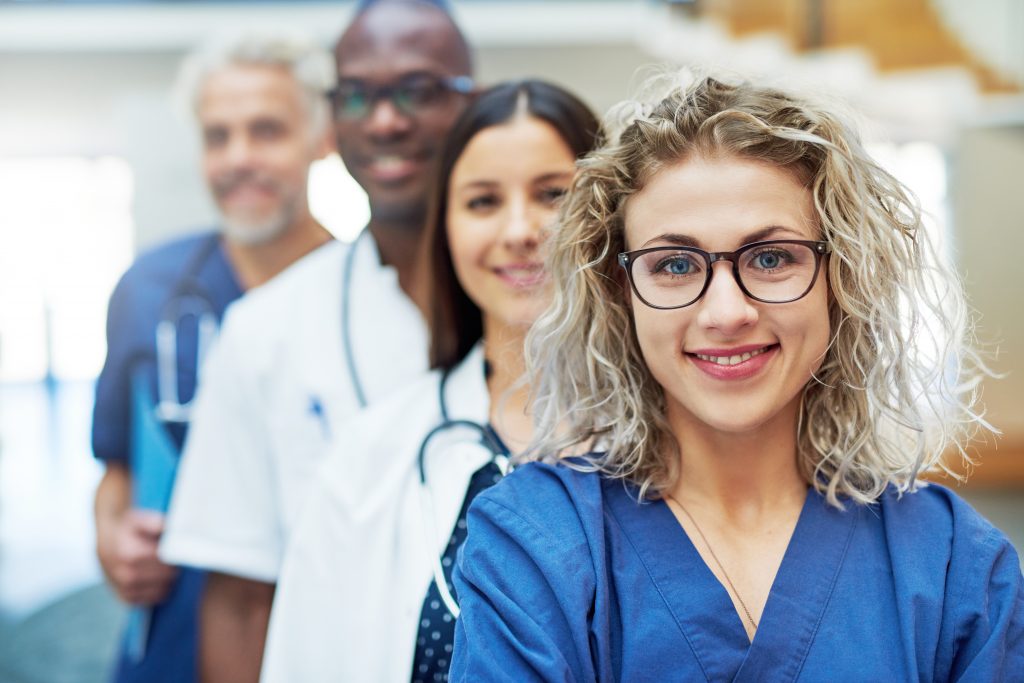 A group of healthcare professionals in an office setting